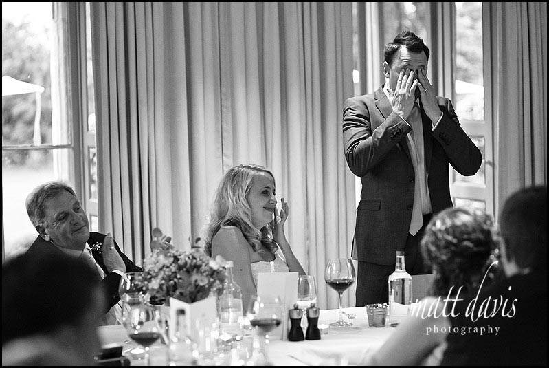 Groom crying during wedding speeches at Barnsley House