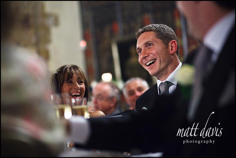 Wedding guests laughing 