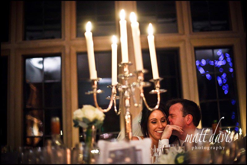 Bibury-court-wedding-photos065 Wedding couple kiss by candle light