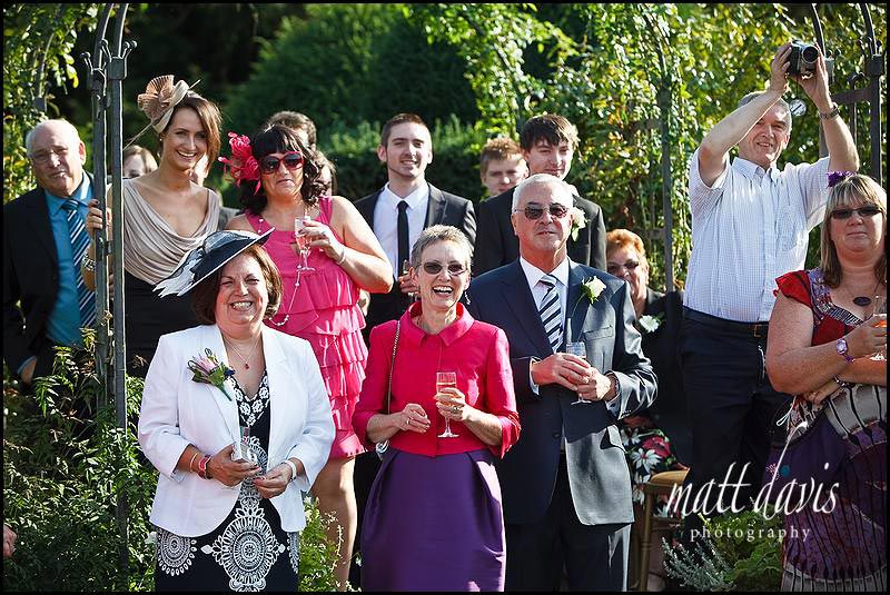 outdoor wedding ceremony in the White Garden at Birtsmorton Court