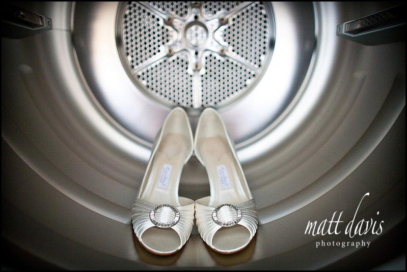 unusual photo of brides wedding shoes