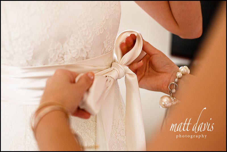 silk ribbon bow on vintage look wedding dress