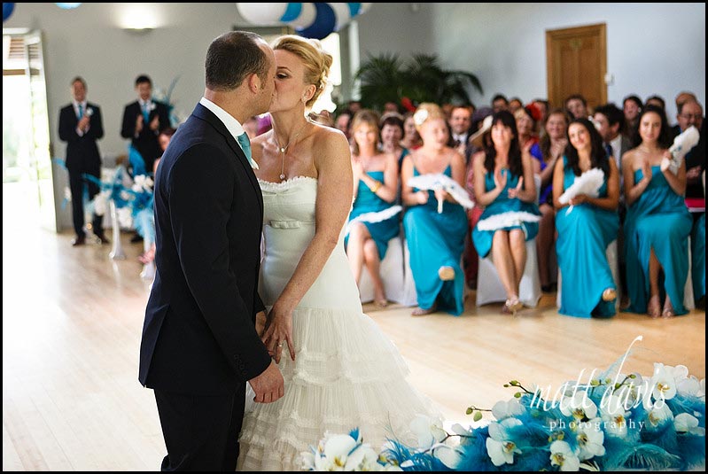 Bride and groom kiss at Matara