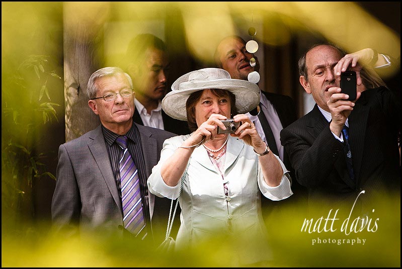 Wedding guests taking photos at Matara