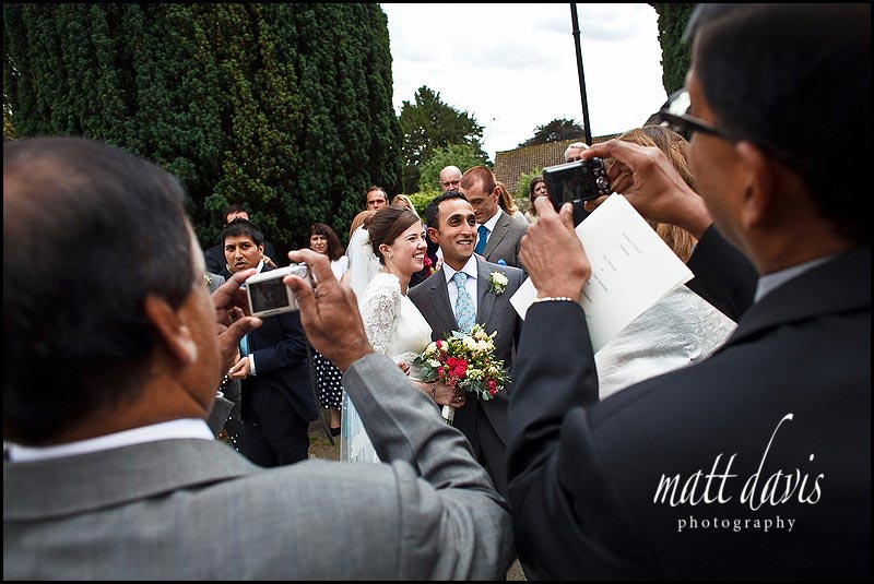 wedding guests taking photos