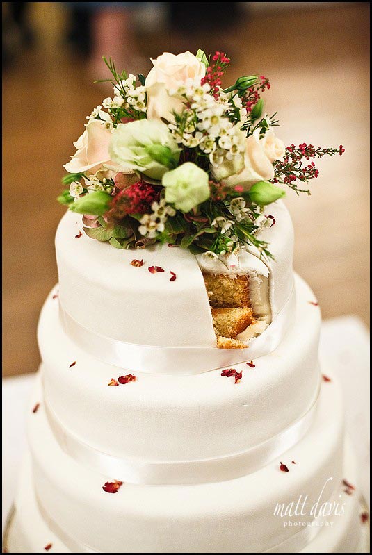 Wedding cake with a slice missing