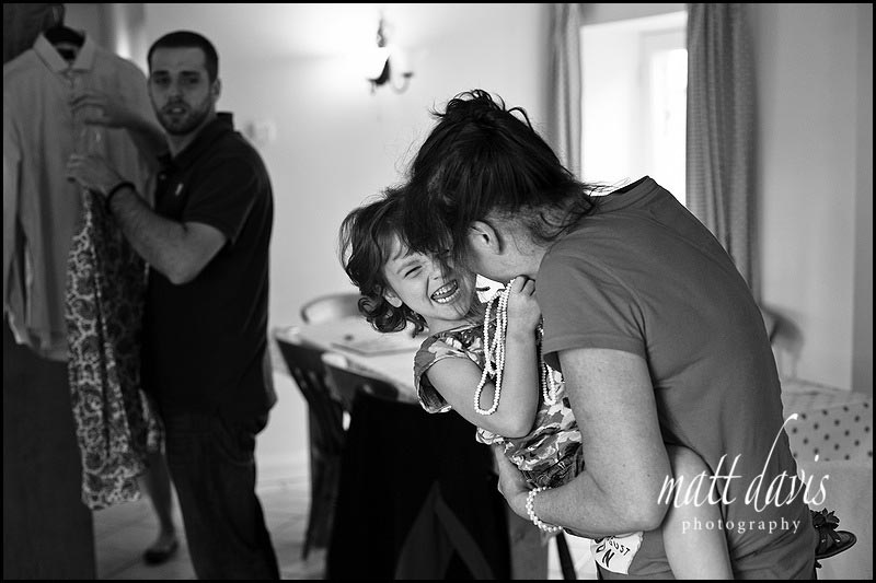 bridesmaid laughing at wedding