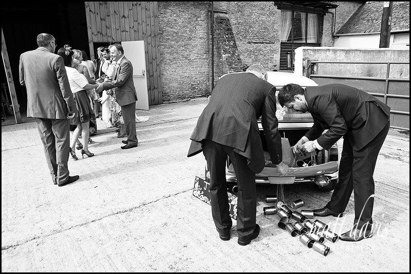 Tin cans tied to wedding car