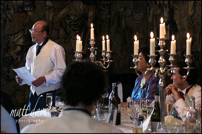 wedding speeches candle lit at Berkeley Castle