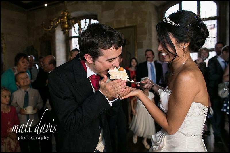 cake cutting at Berkeley Castle wedding