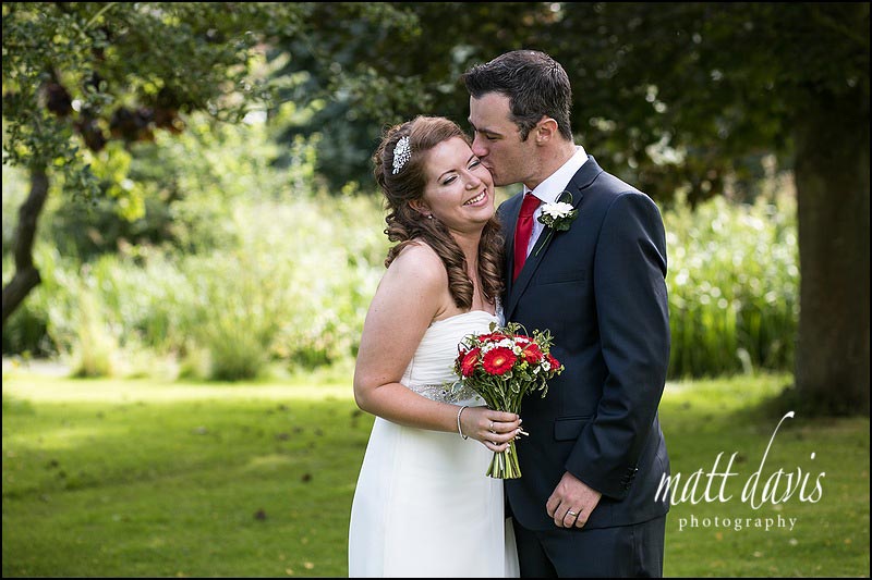 Friars Court wedding photographs of couple kissing