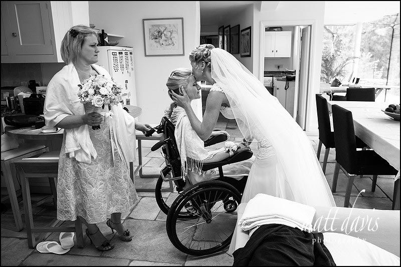 Bridesmaid in wheelchair at wedding in the Cotswolds