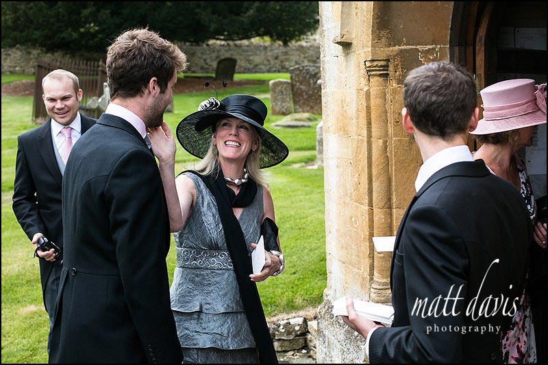 Wedding-photography-Berkeley-Castle-025 Wedding guests at Naunton Church