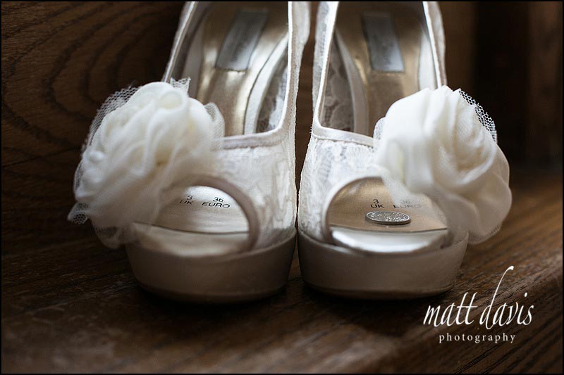 Stanton-House-Hotel-wedding-photos-009 Fantastic cream wedding shoes with large flower and sixpence inside for good luck