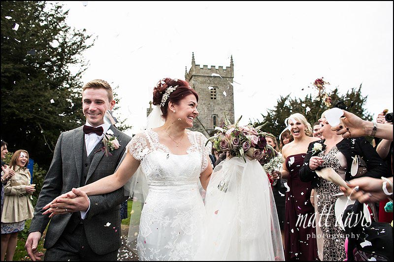 Colour wedding photos of bride and groom outside St. Leonard's Church, Stanton Fitzwarren
