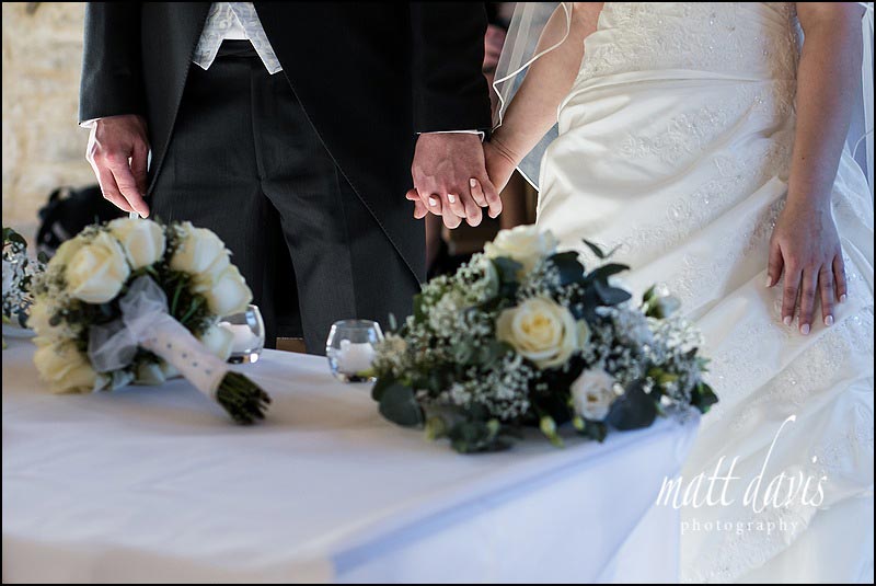 Discrete wedding photography at Kingscote Barn Gloucestershire by Matt Davis