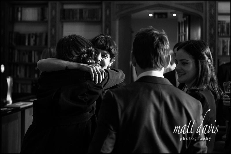 high contrast Black and white photo of wedding guests at Dumbleton Hall