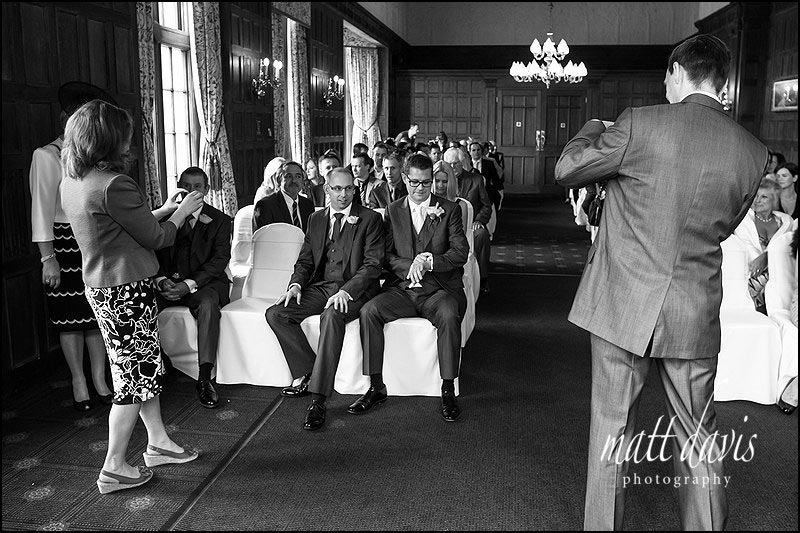 Groom awaits brides arrival at Dumbleton Hall wedding