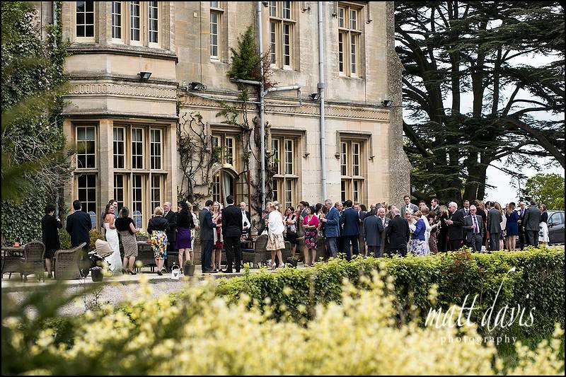 Dumbleton Hall wedding photos taken of guests in the gardens