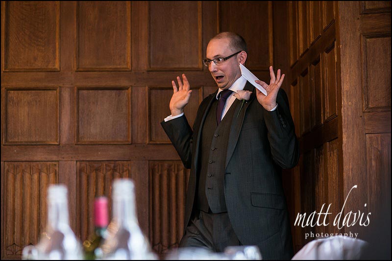 wedding photo of Best man pulling a funny face during his speech
