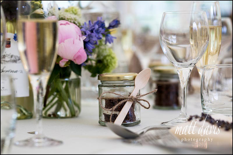 Unique wedding favours in jars with spoon attached 