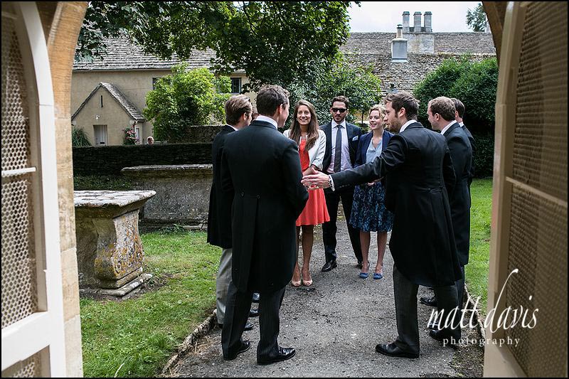  Wedding guests outside Beverston Church, Gloucestershire