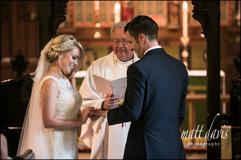Wedding ceremony with ring exchange at Kingscote Church