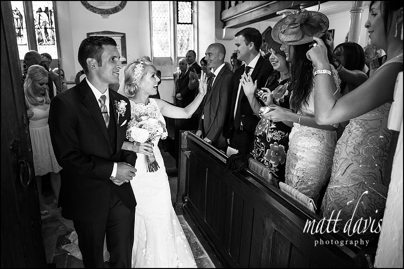 black and white documentary wedding photography at Kingscote Church by Matt Davis