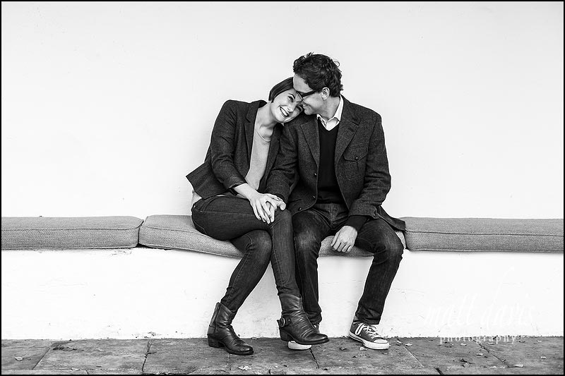Black and white engagement photo taken at Barnsley House, Gloucestershire