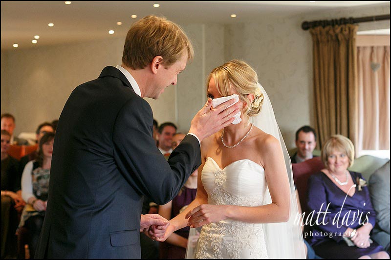 wedding tears during a civil ceremony at The Bear of Rodborough in Gloucestershire