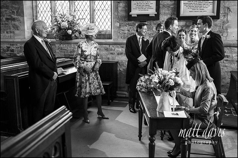 documentary wedding photos by Matt Davis Photography taken during signing of the wedding register
